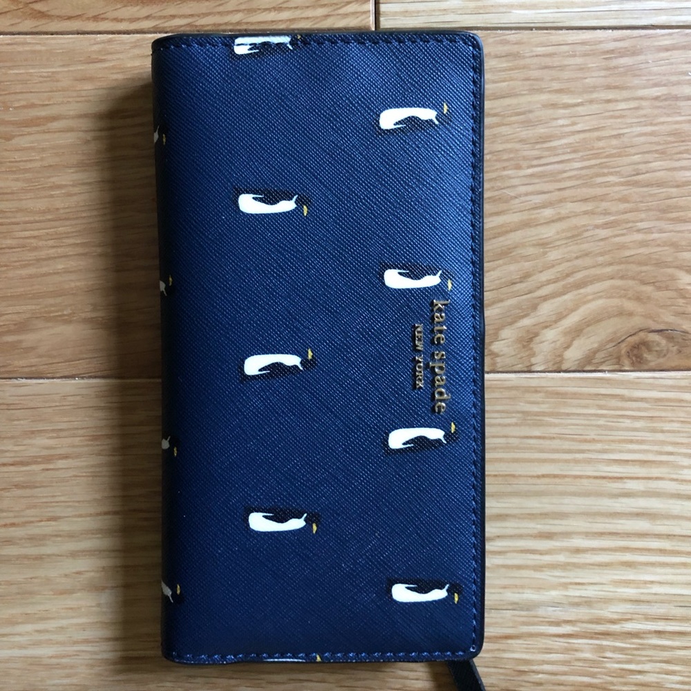 Kate Spade blue wallet with adorable penguins